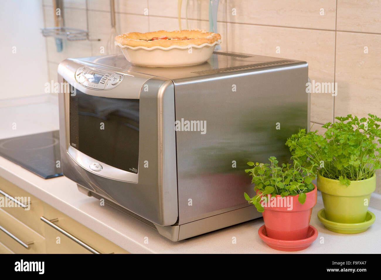 Baking in Microwave Oven Stock Photo Alamy