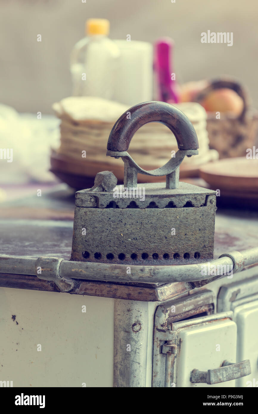 Old antique vintage brass coal iron flatiron Stock Photo Alamy