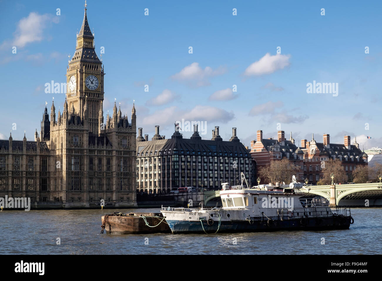 Working Boats in Front of the Houses of Parliament Stock Photo