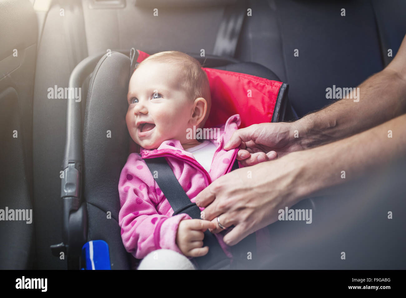 Little girl in car seat hires stock photography and images Alamy