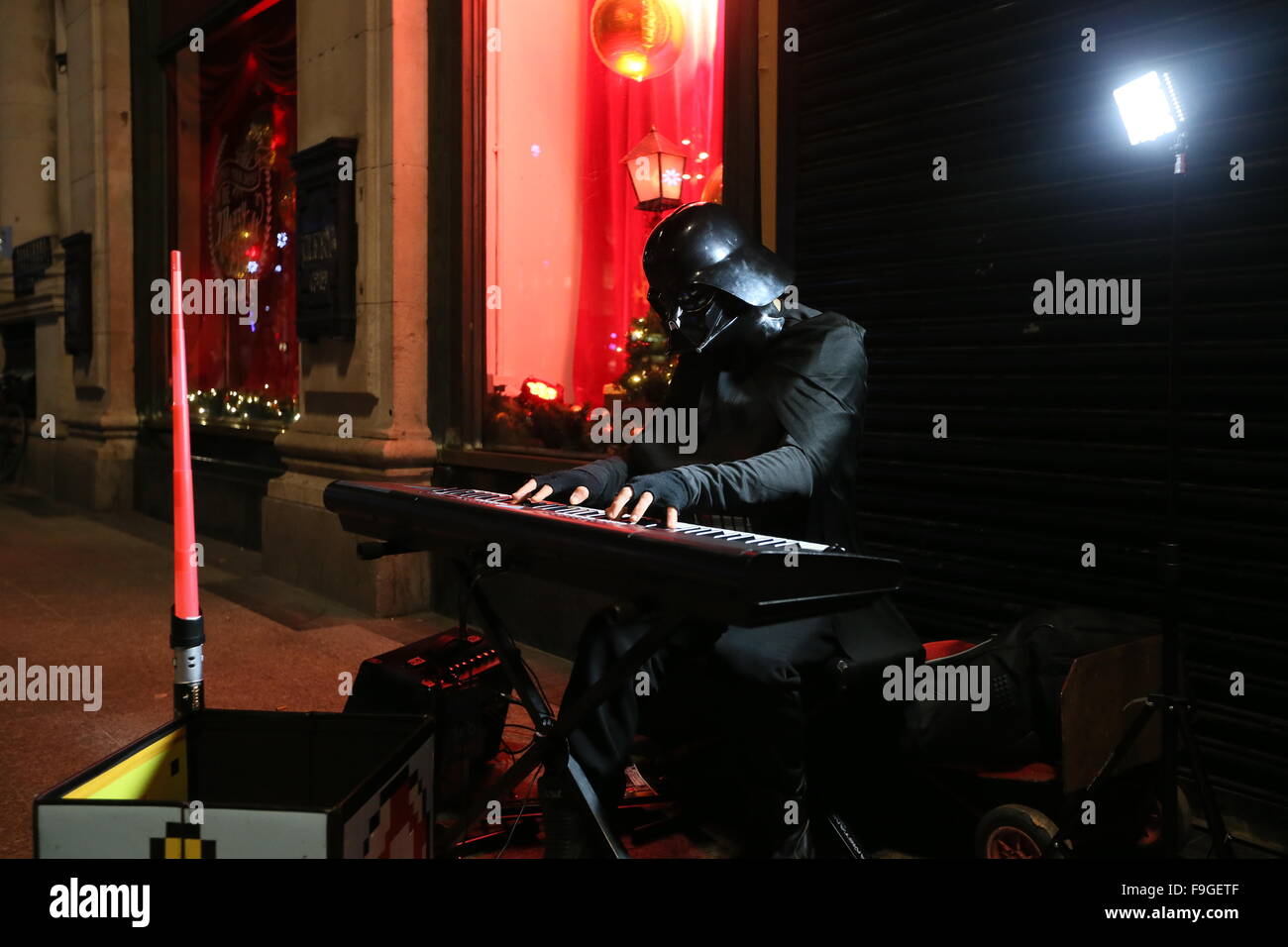 Dublin, Ireland. 16th Dec, 2015. A busker dressed up as Darth Vader ...