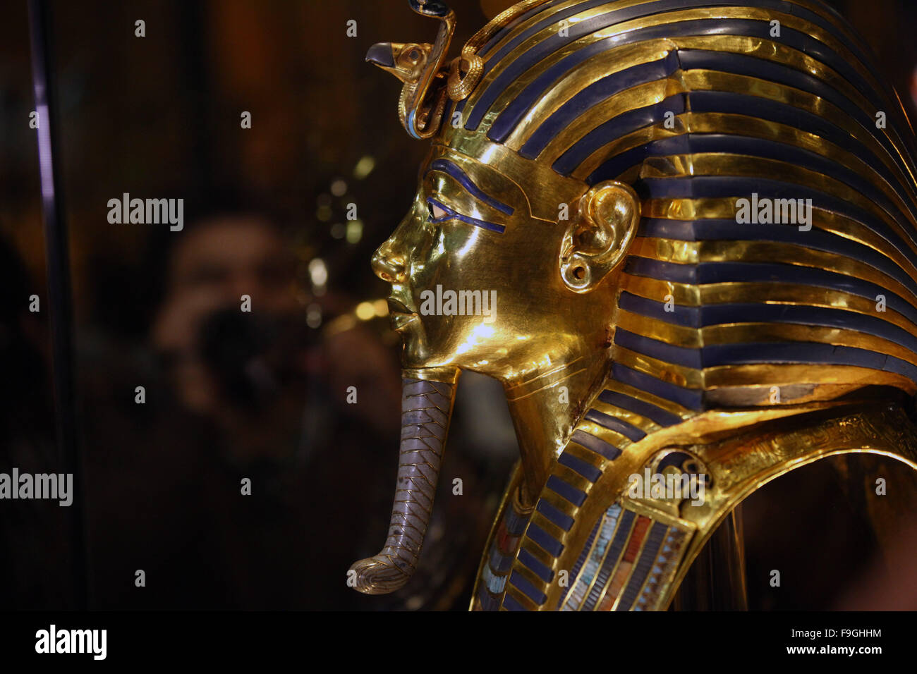 Cairo. 16th Dec, 2015. Photo taken on Dec. 16, 2015 shows details of the golden mask of Tutankhamun at the Egyptian Museum, in Cairo, Egypt. The golden burial mask of King Tutankhamen, one of ancient Egypt's most famous artifacts, was put back Wednesday on display at the Egyptian Museum after eight weeks of restoration by an Egyptian-German team. Credit:  Ahmed Gomaa/Xinhua/Alamy Live News Stock Photo