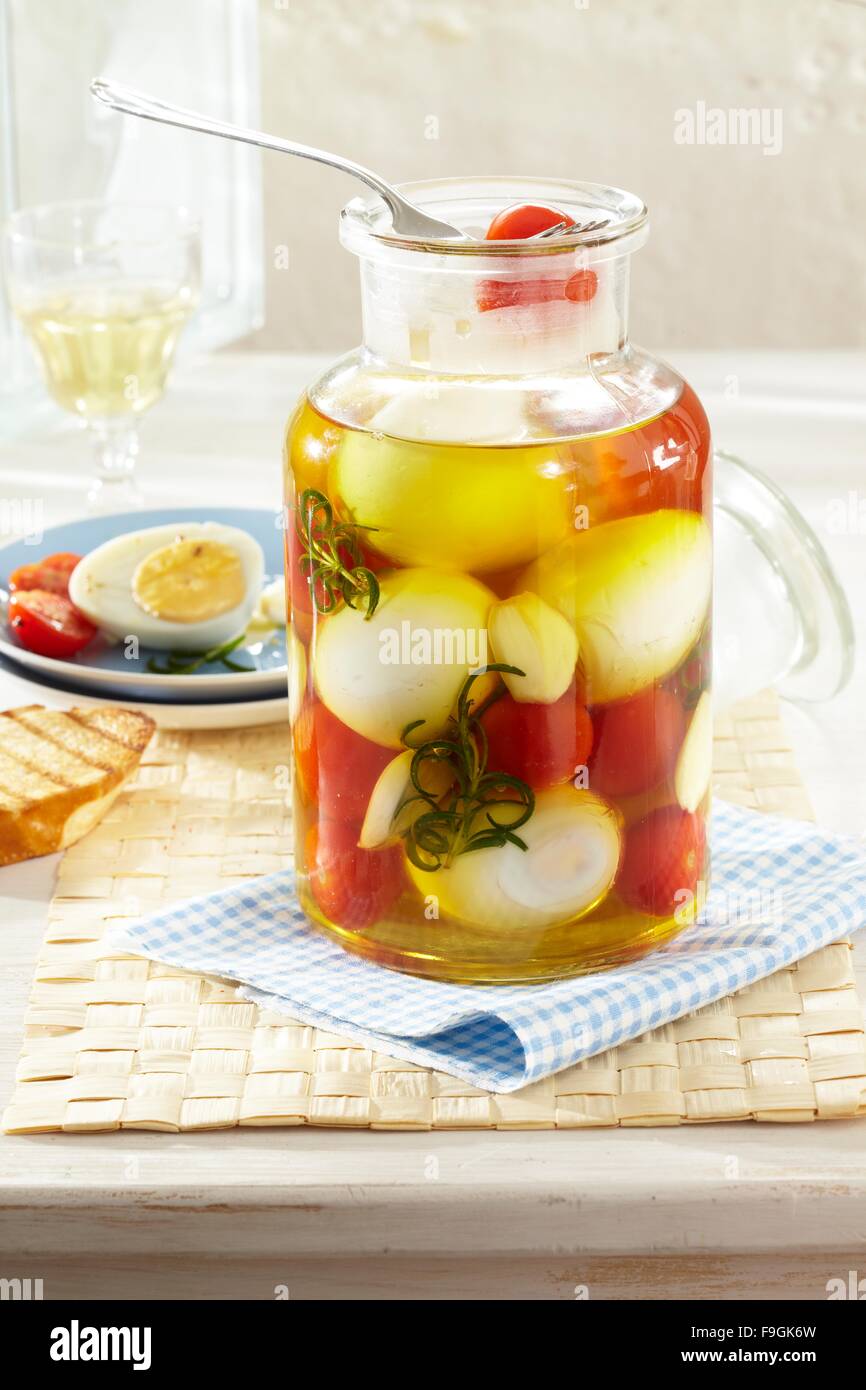Pickled Eggs in Herb Oil Stock Photo Alamy