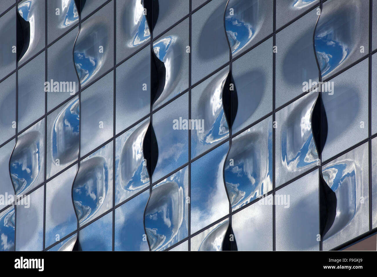 Glass façade with reflection of clouds, Elbe Philharmonic Hall ...