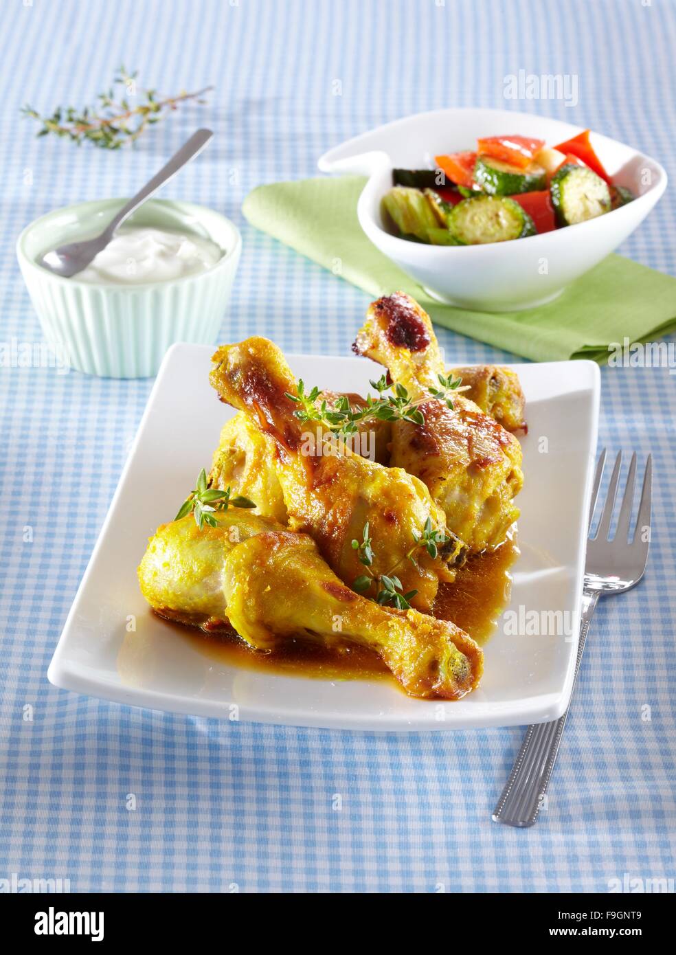 Chicken Drumsticks in Spicy Yoghurt Stock Photo Alamy