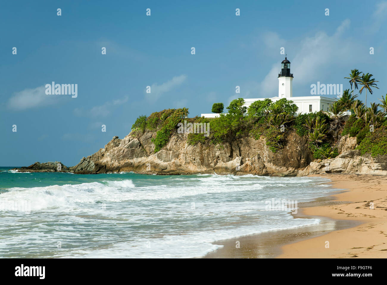 Surf and Punta Tuna Lighthouse (1892), Maunabo, Puerto Rico Stock Photo