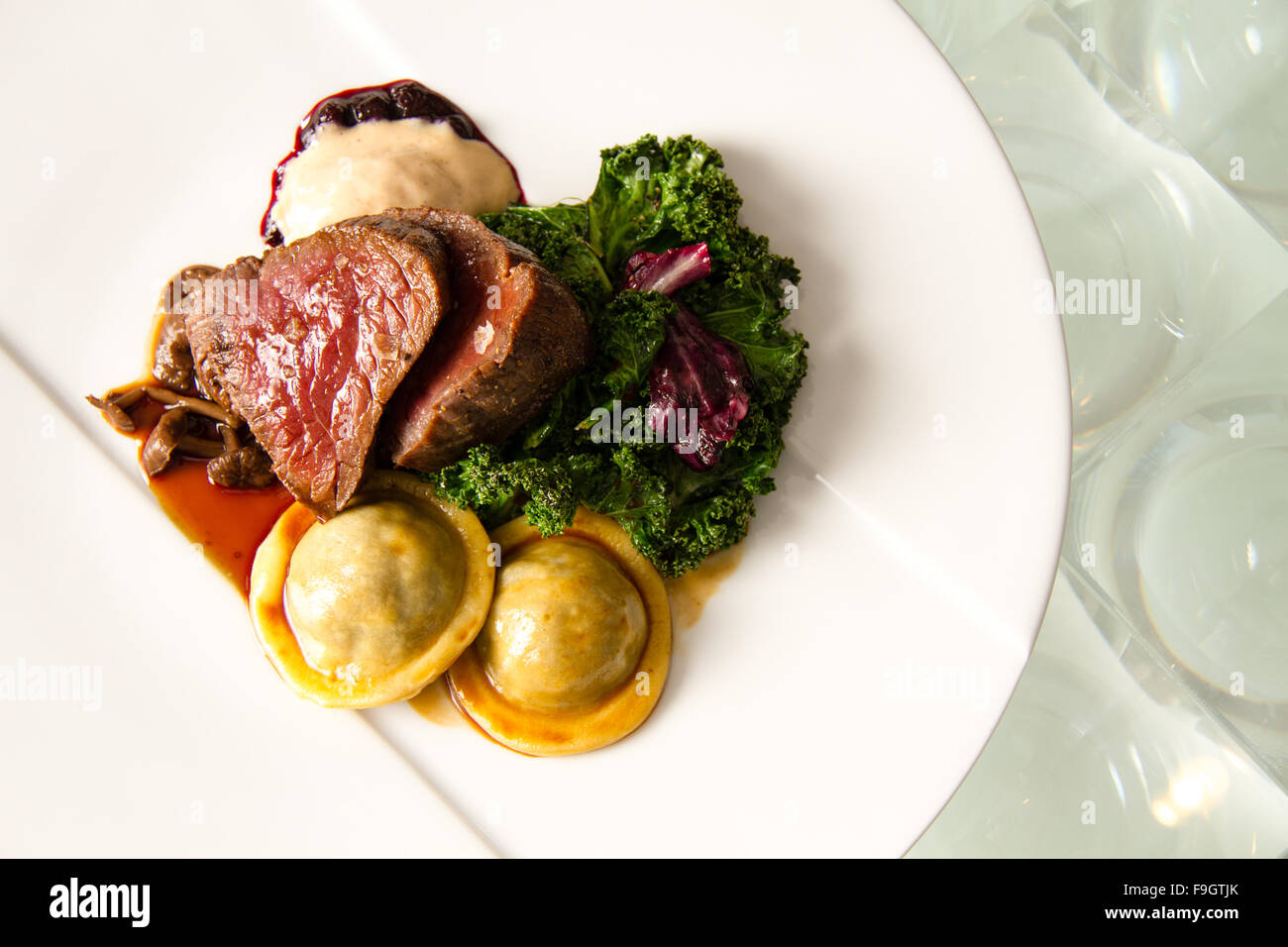 Smoked loin of elk with gingerbread ravioli, huckleberry compote