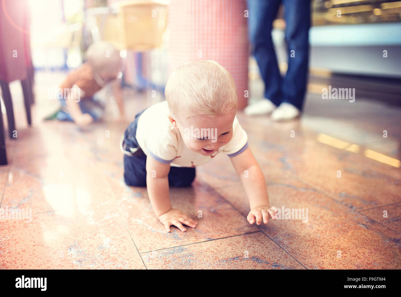 Little boy enjoying their time in cafe Stock Photo