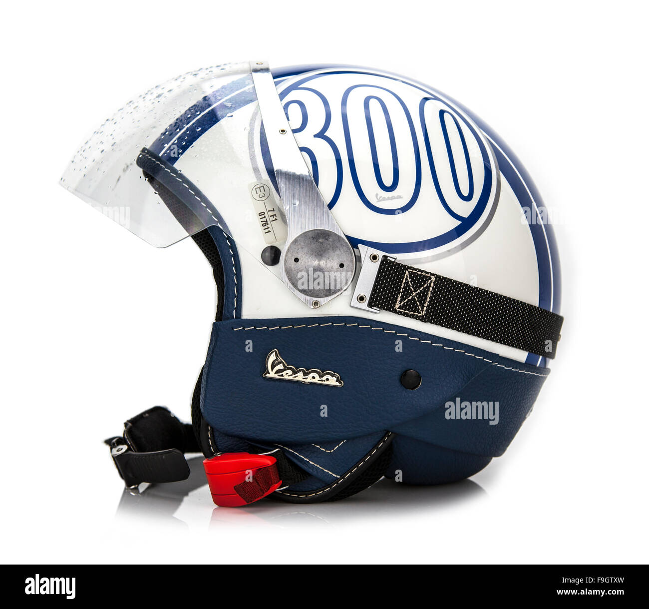 Vespa 300 logo Crash Helmet shot in studio on a white background Stock Photo