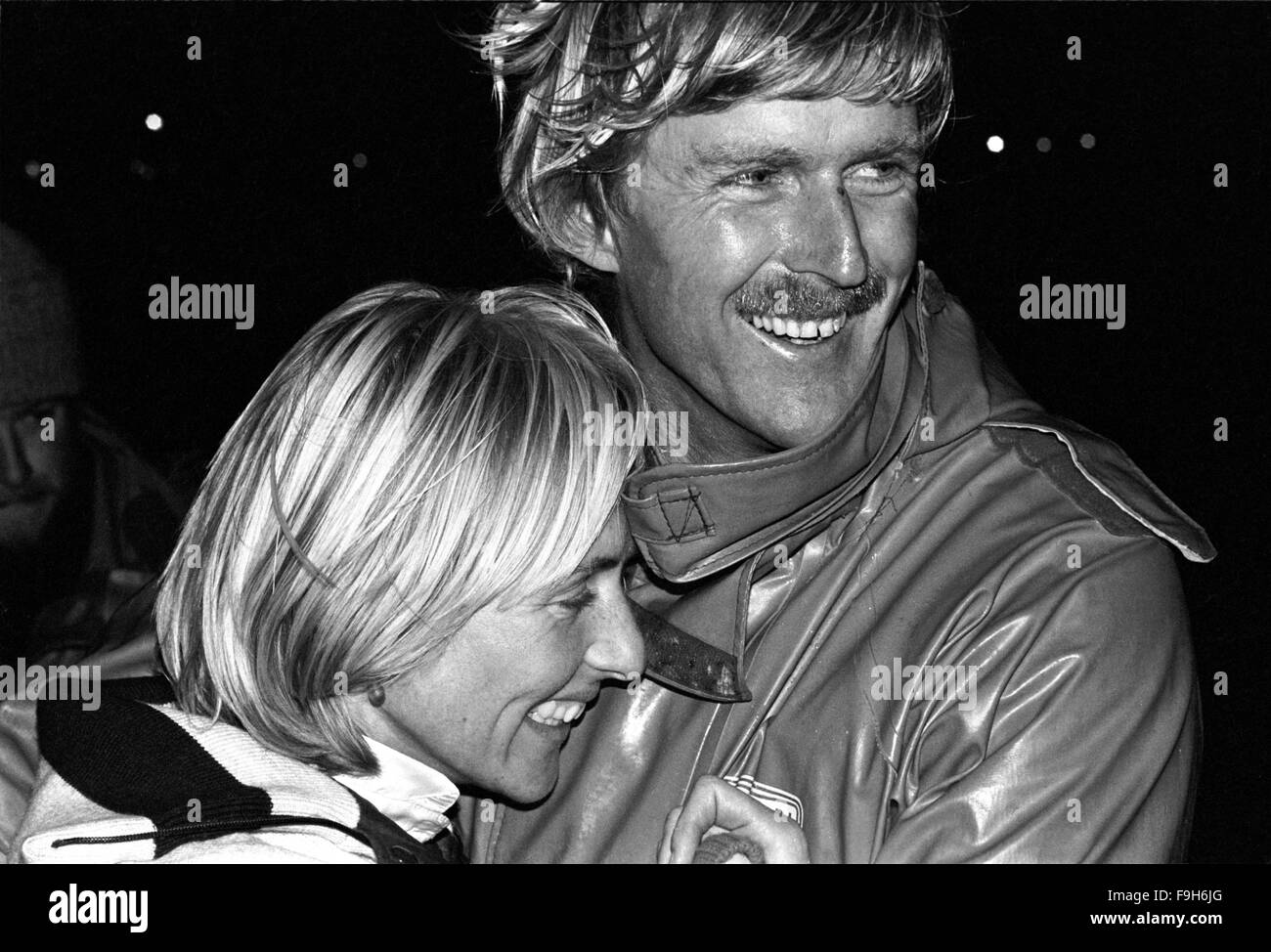 AJAXNETPHOTO. MARCH 30TH, 1982. PORTSMOUTH, ENGLAND -  HOME AT LAST - KIWI YACHT ARRIVES - CERAMCO NEW ZEALAND ARRIVES AT THE END OF THE FOURTH LEG OF THE WHITBREAD RACE. SKIPPER PETER BLAKE GETS A WARM WELCOME FROM HIS WIFE PIPPA. PHOTO:JONATHAN EASTLAND/AJAX REF;820304 5A Stock Photo