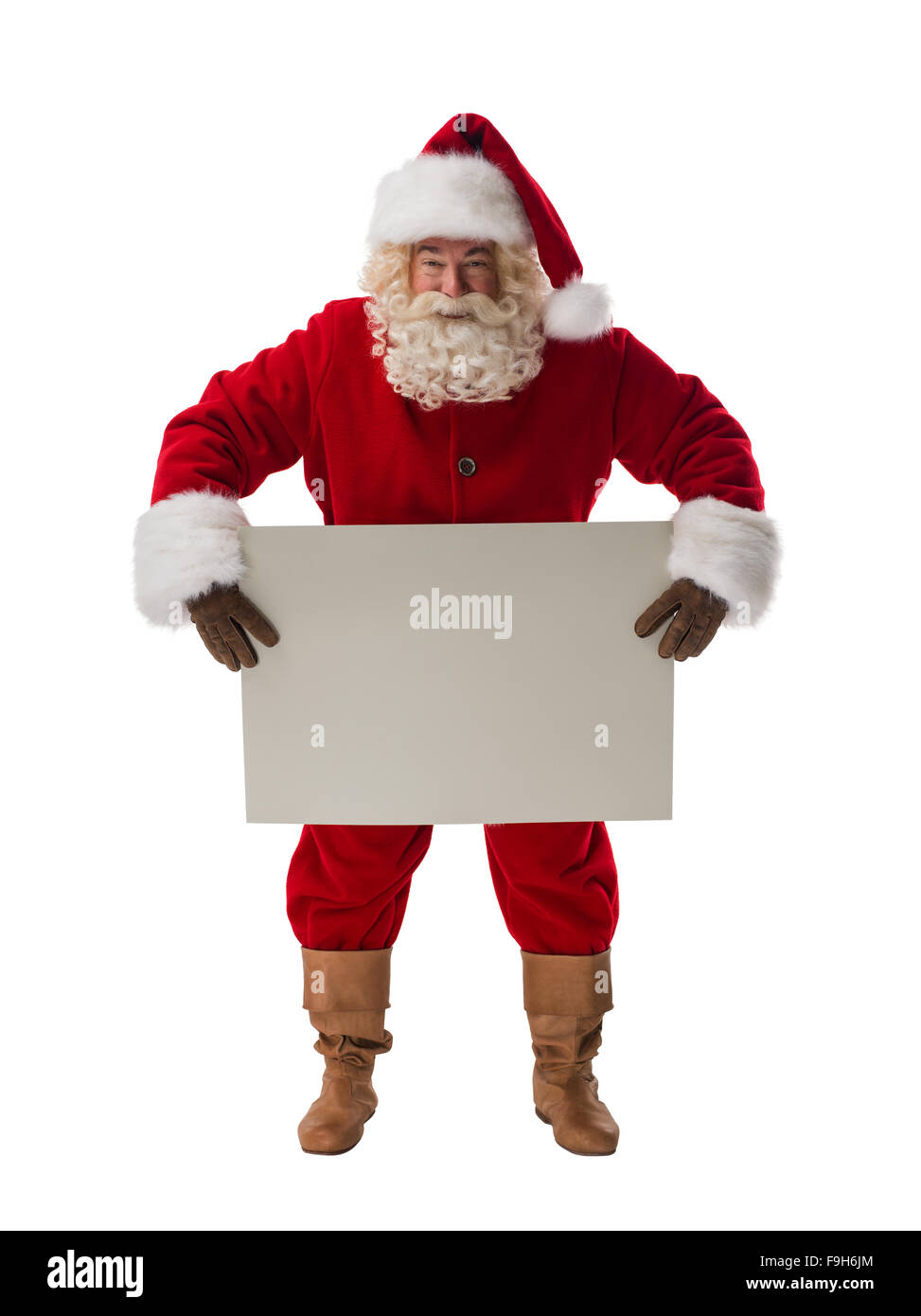 Santa Claus holding white blank sign Full Length Portrait. Isolated on ...