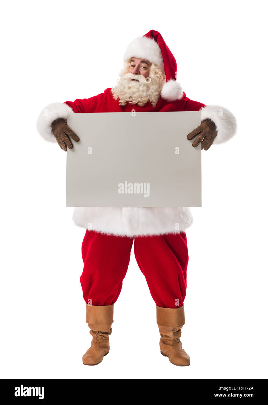 Santa Claus holding white blank sign Full Length Portrait. Isolated on ...