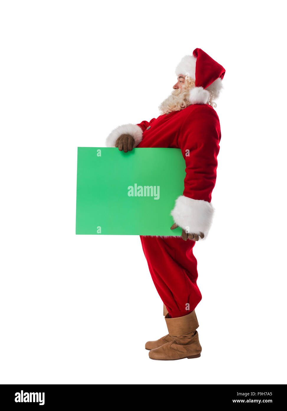 Santa Claus holding green blank sign Full Length Portrait. Isolated on ...