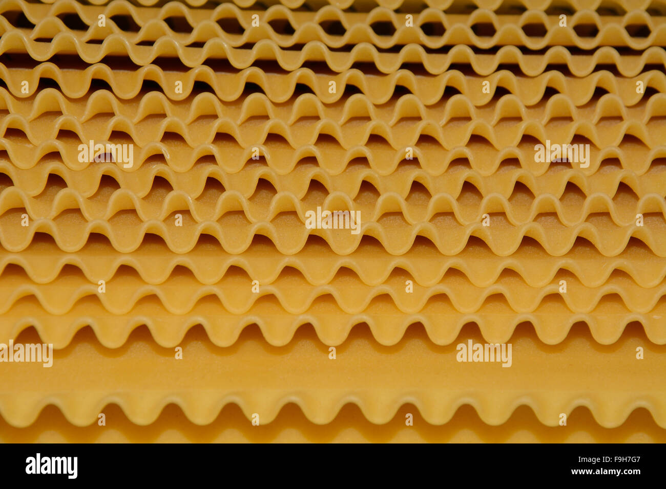 Raw uncooked lasagna pasta noodles Stock Photo Alamy