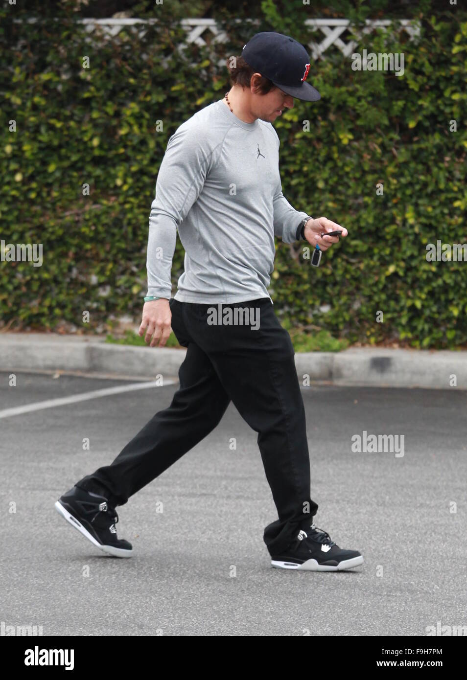 Mark Wahlberg showing his toned torso in a tight t-shirt with Nike  “Jumpman” logo for Air Jordan, goes shopping at Bristol Farms in Beverly  Hill Featuring: Mark Wahlberg Where: Los Angeles, California,