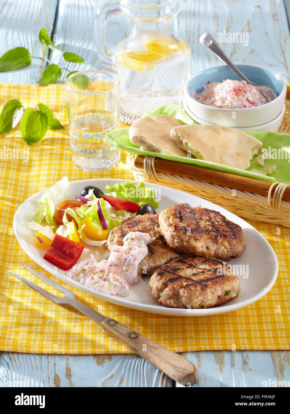 Greek patties with radish dip Stock Photo Alamy