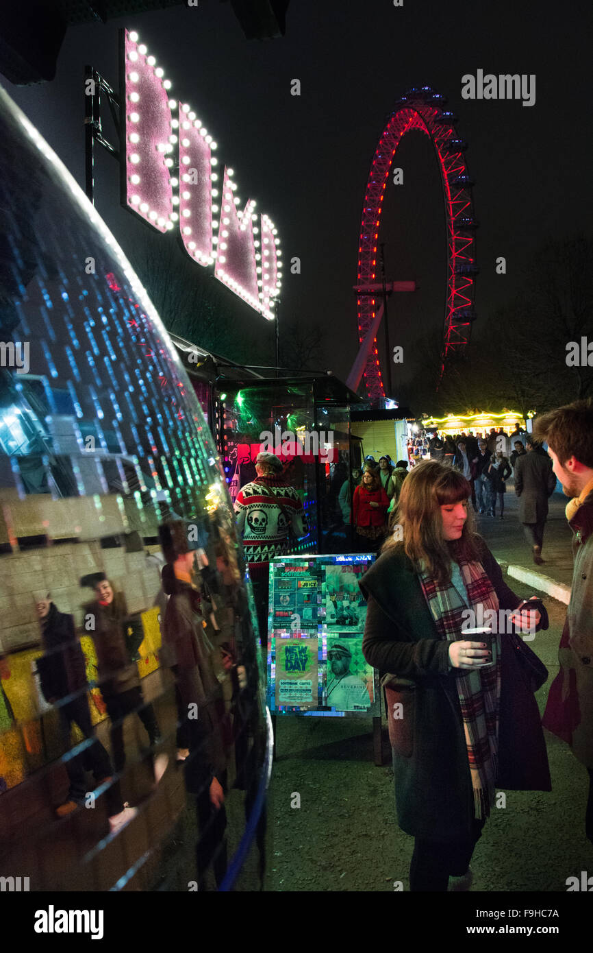 A woman on a mobile phone near the London Eye and Bump on London's