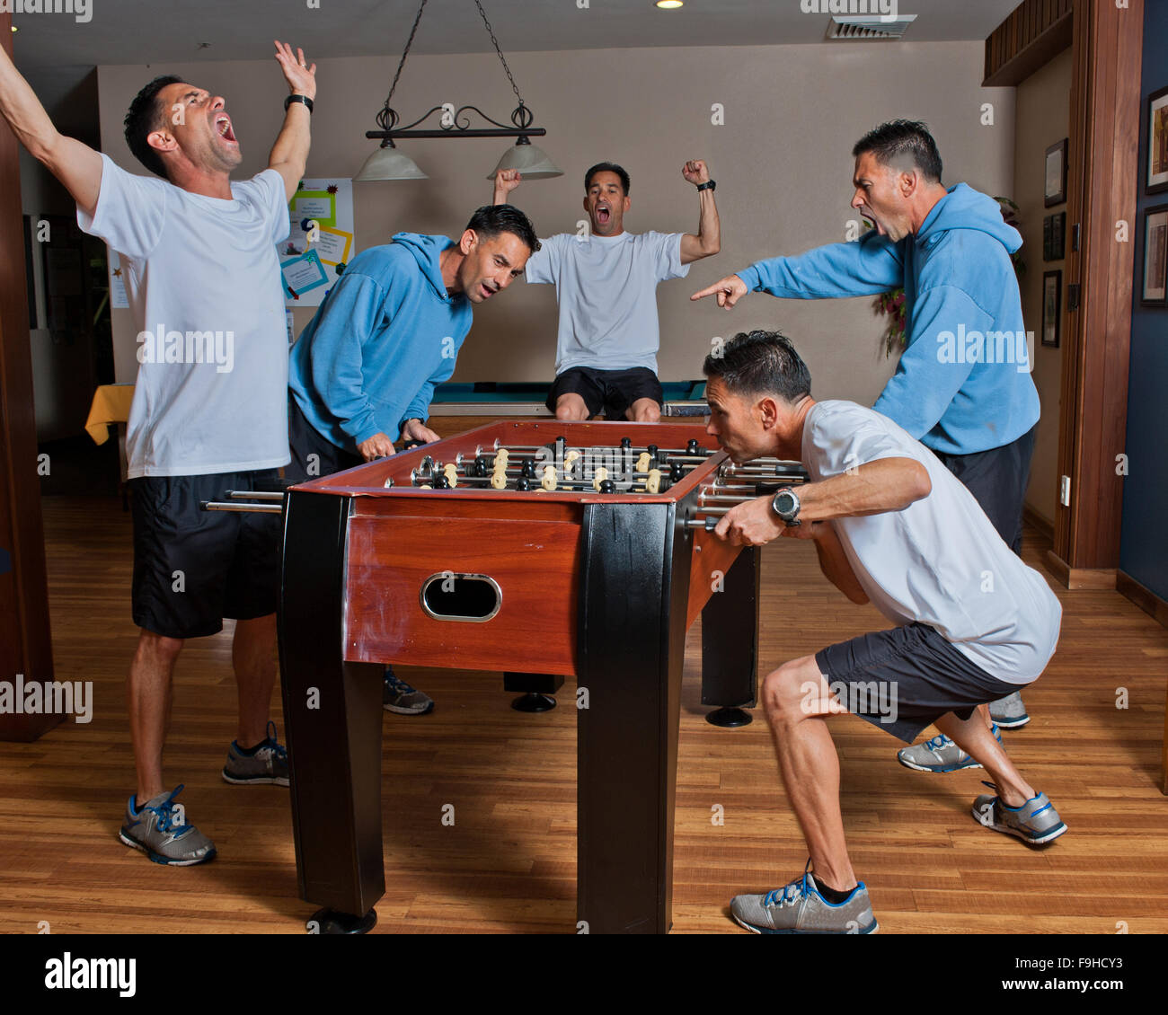 Middle age man showing multiple emotions in competition Stock Photo