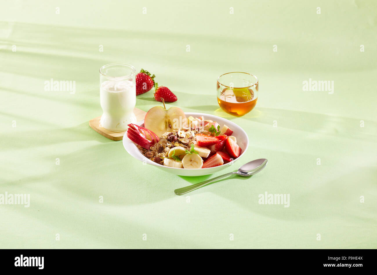 Roast oat flakes with nuts and yoghurt Stock Photo Alamy