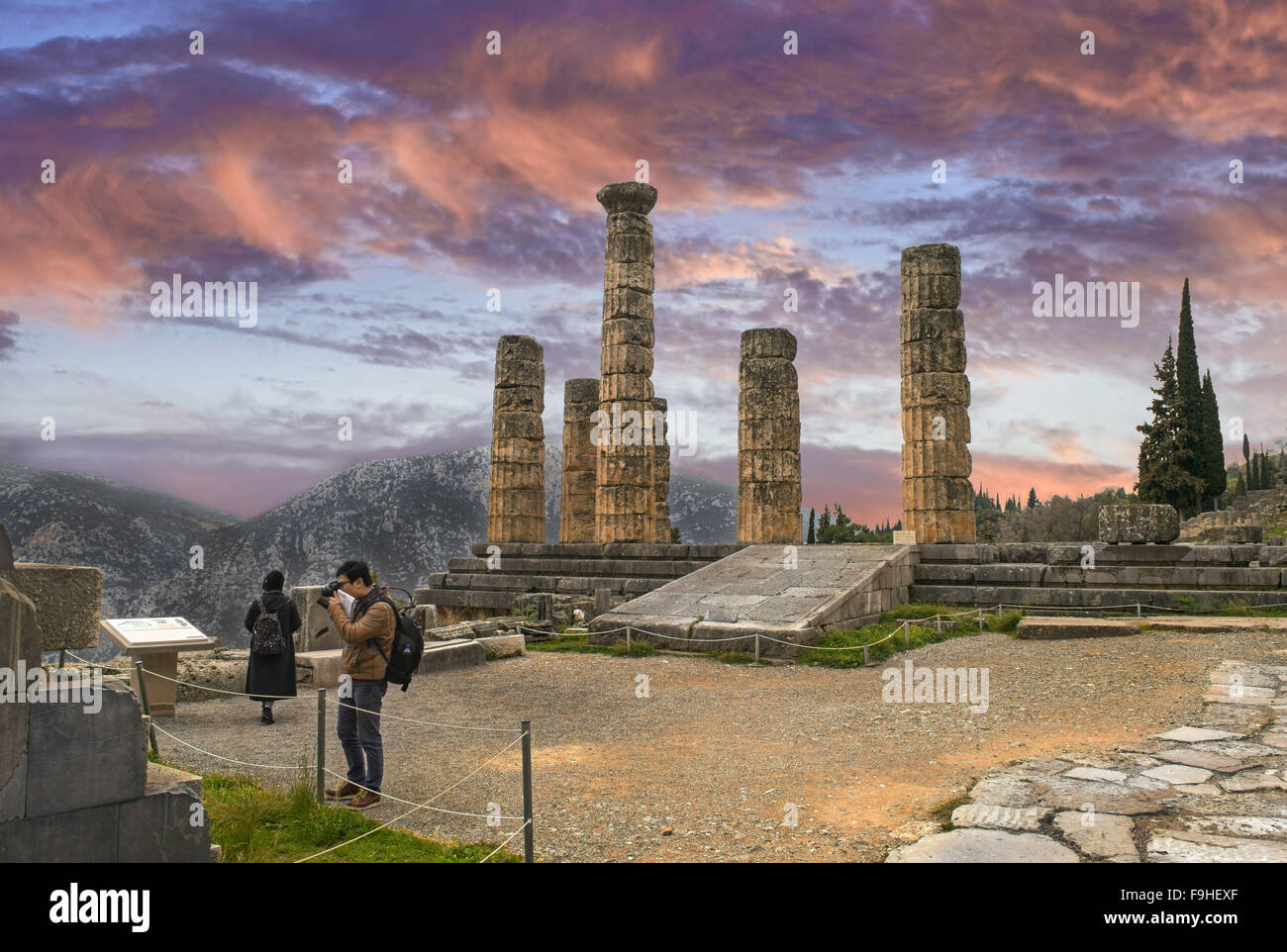 The Temple of Apollo and the ancient theatre in Delphi archaeological site in Fokida region, Central Greece Stock Photo
