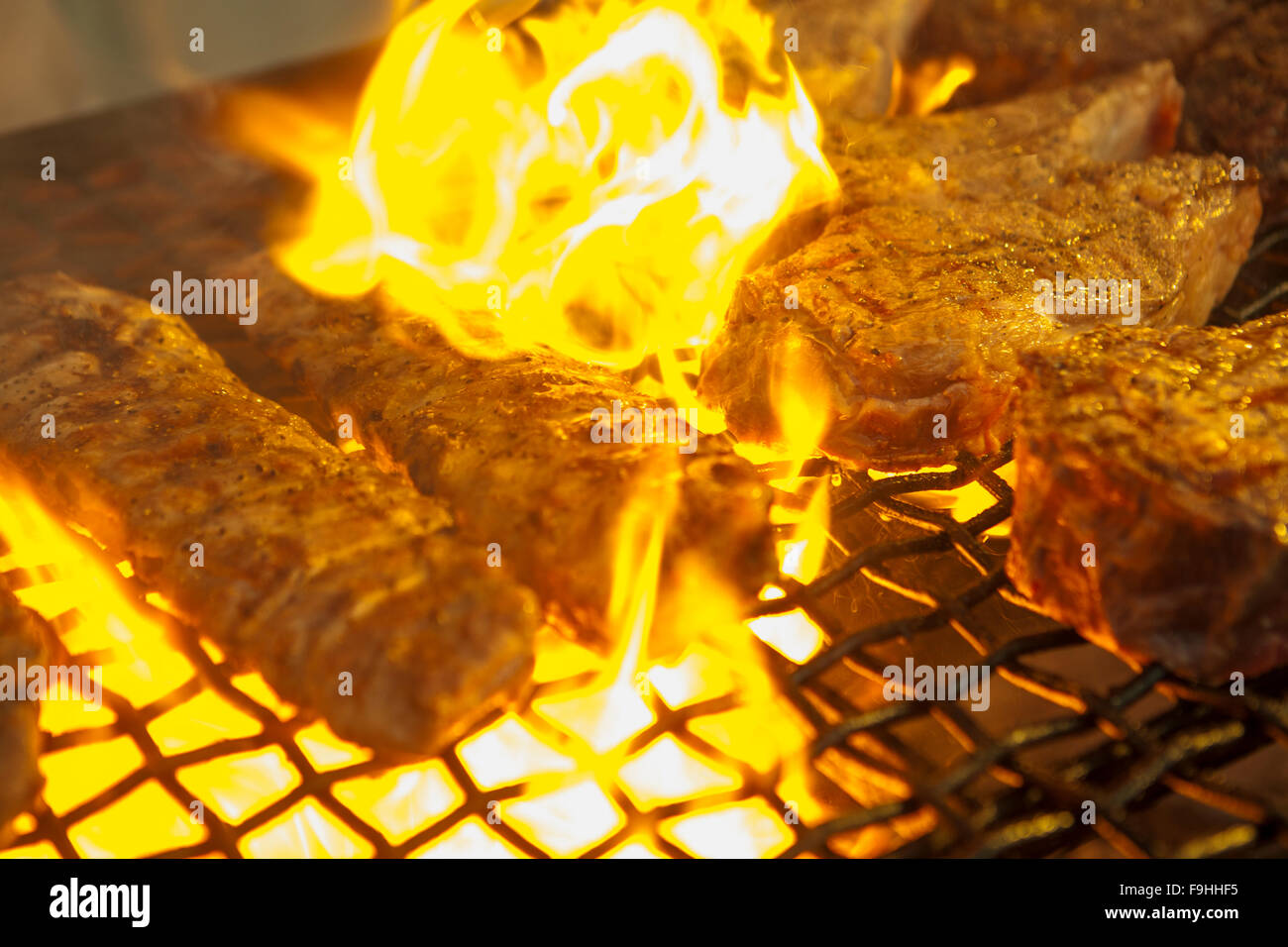 beef ribs and ribeye steaks grilling, BBQ Bootcamp, Alisal Guest Ranch, Solvang, California Stock Photo