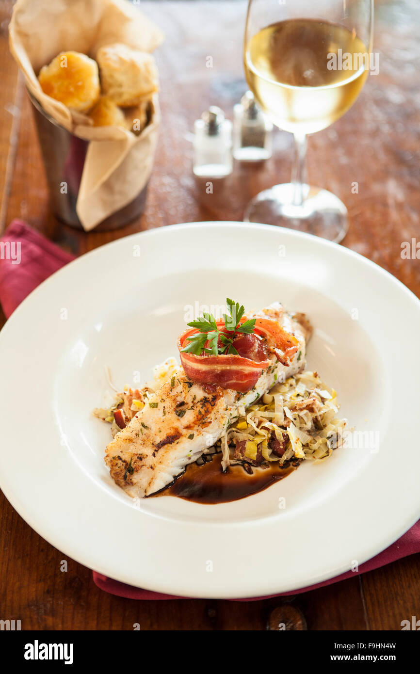 grilled seabass with pancetta and mustard-braised leeks, tomato jam and pinot noire-shallot sauce, Succulent Cafe, Solvang Stock Photo