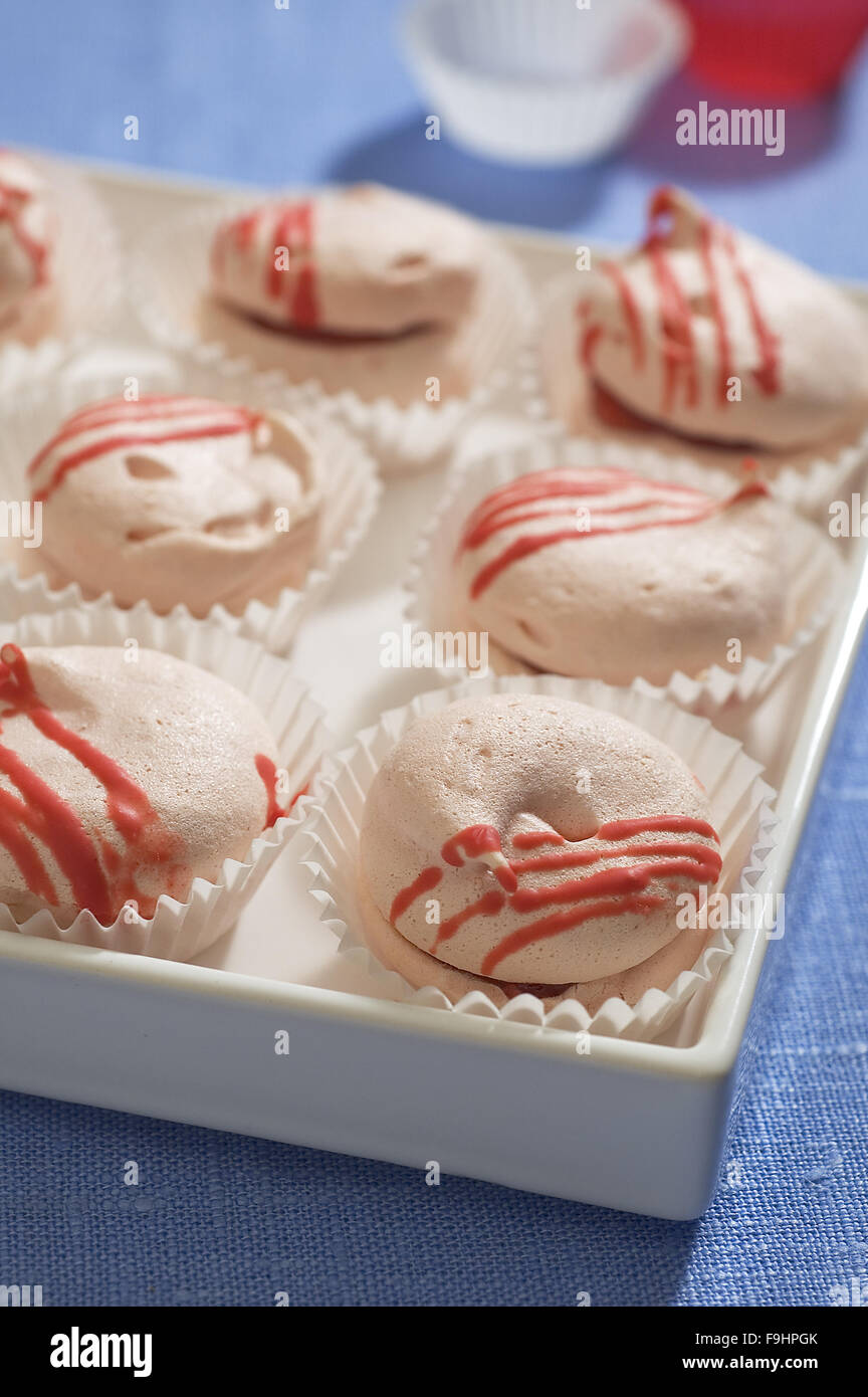 Pink Meringue with Jam Stock Photo Alamy