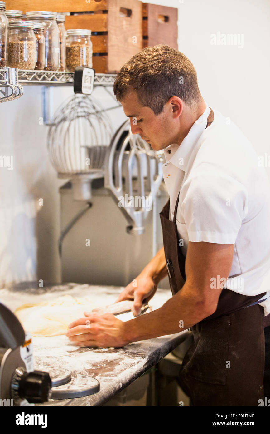 chef and owner Julian Martinez makes hamburger buns, Barbareno ...