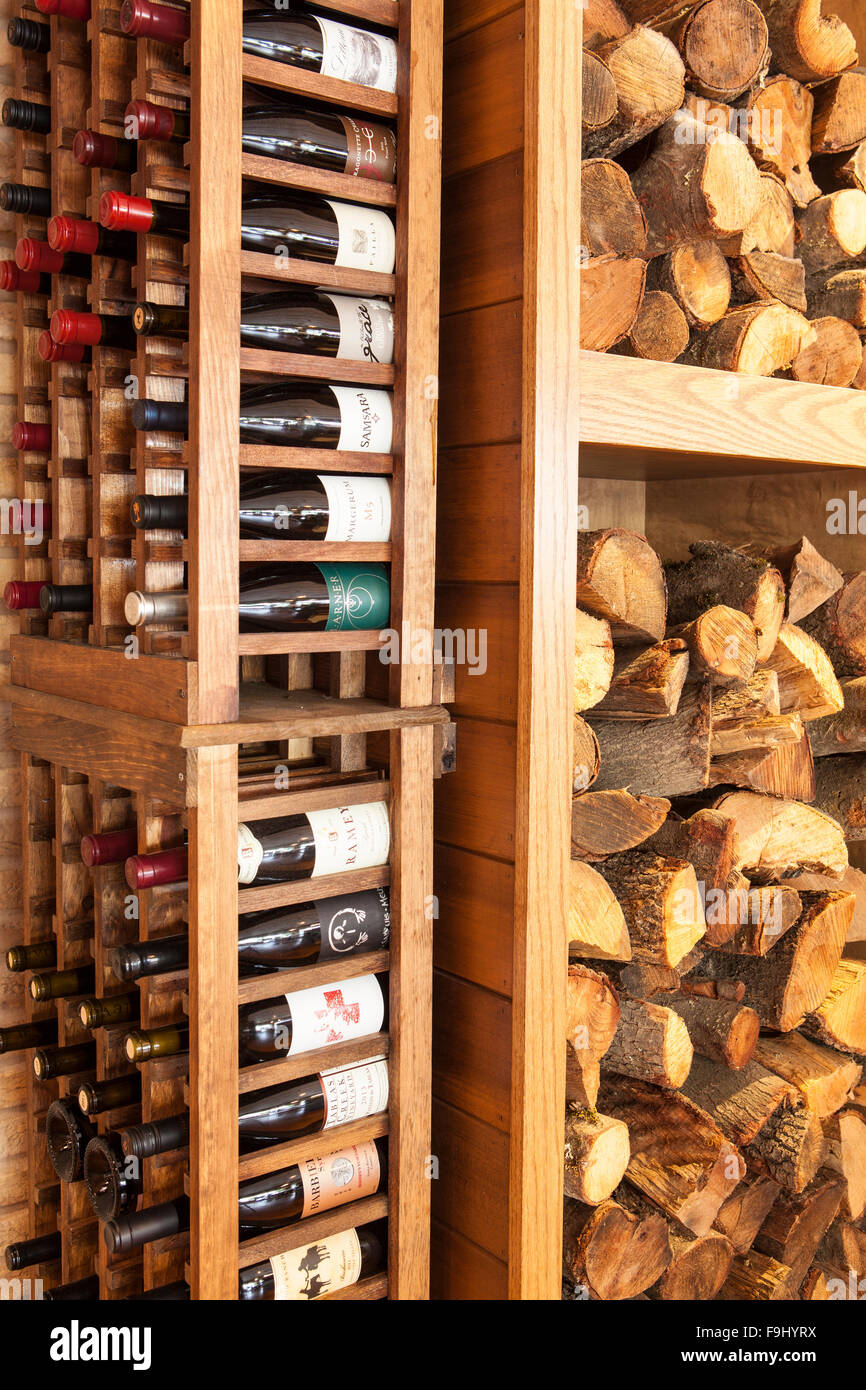 wine rack and firewood for bbq, Barbareno Restaurant, Santa Barbara, California Stock Photo