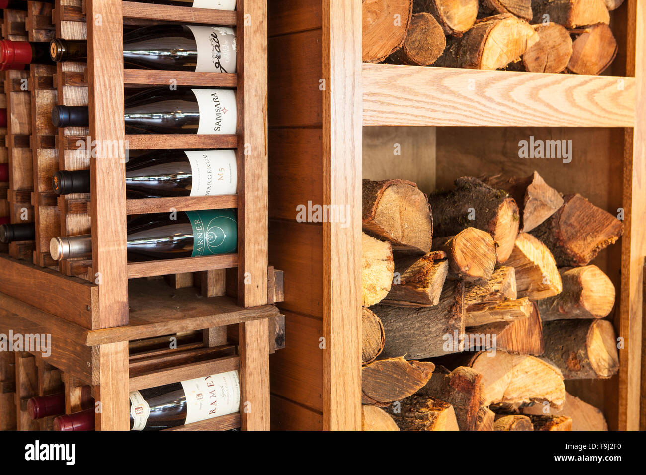 wine rack and firewood for bbq, Barbareno Restaurant, Santa Barbara, California Stock Photo