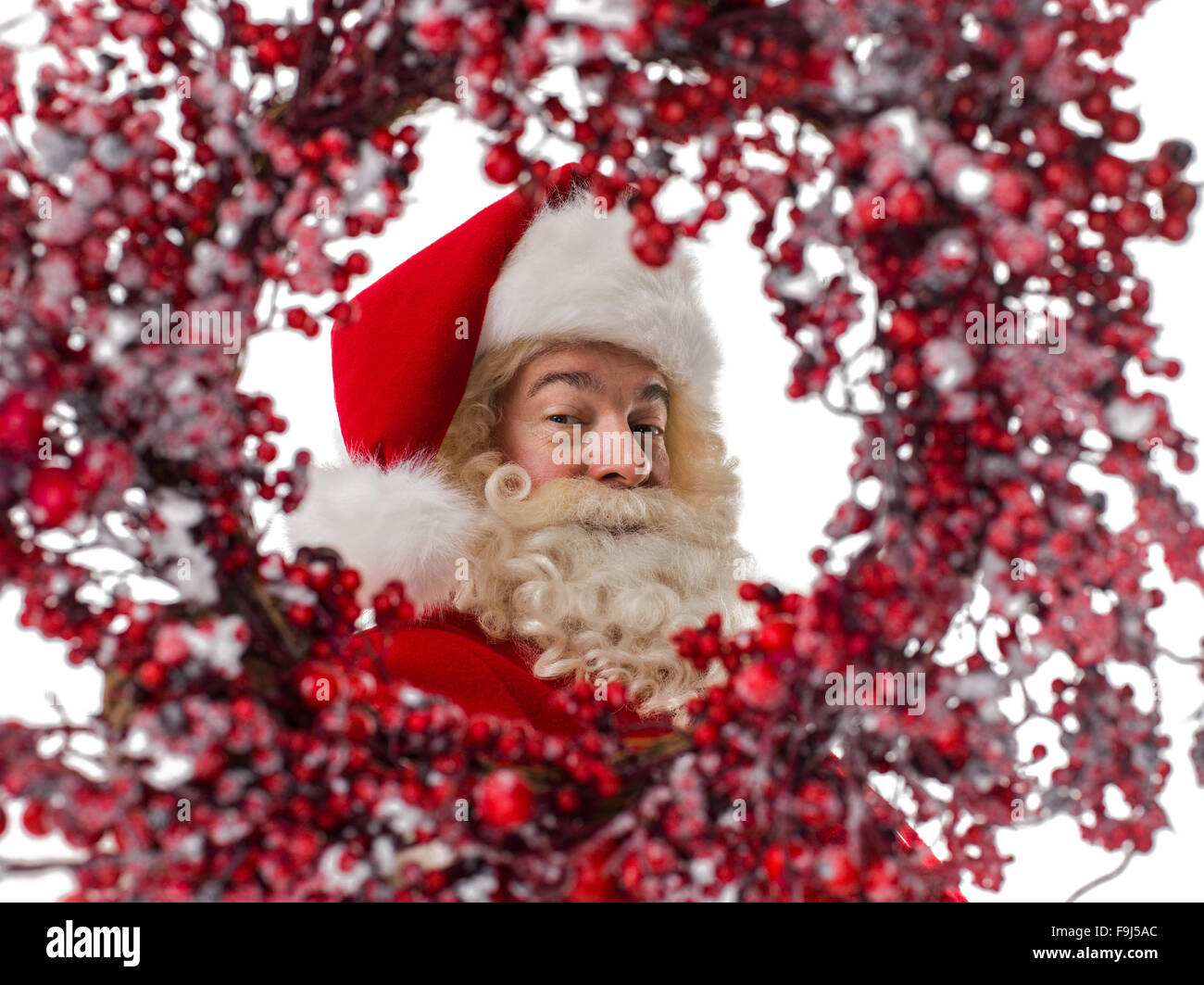 Santa Claus in christmas wreath frame Closeup Portrait Stock Photo - Alamy