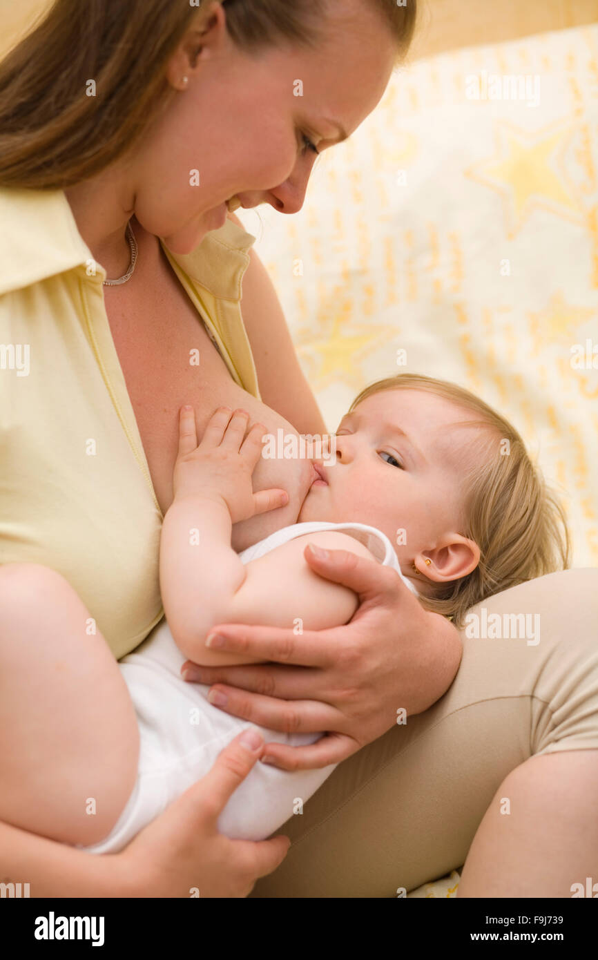 mother breastfeeding her baby