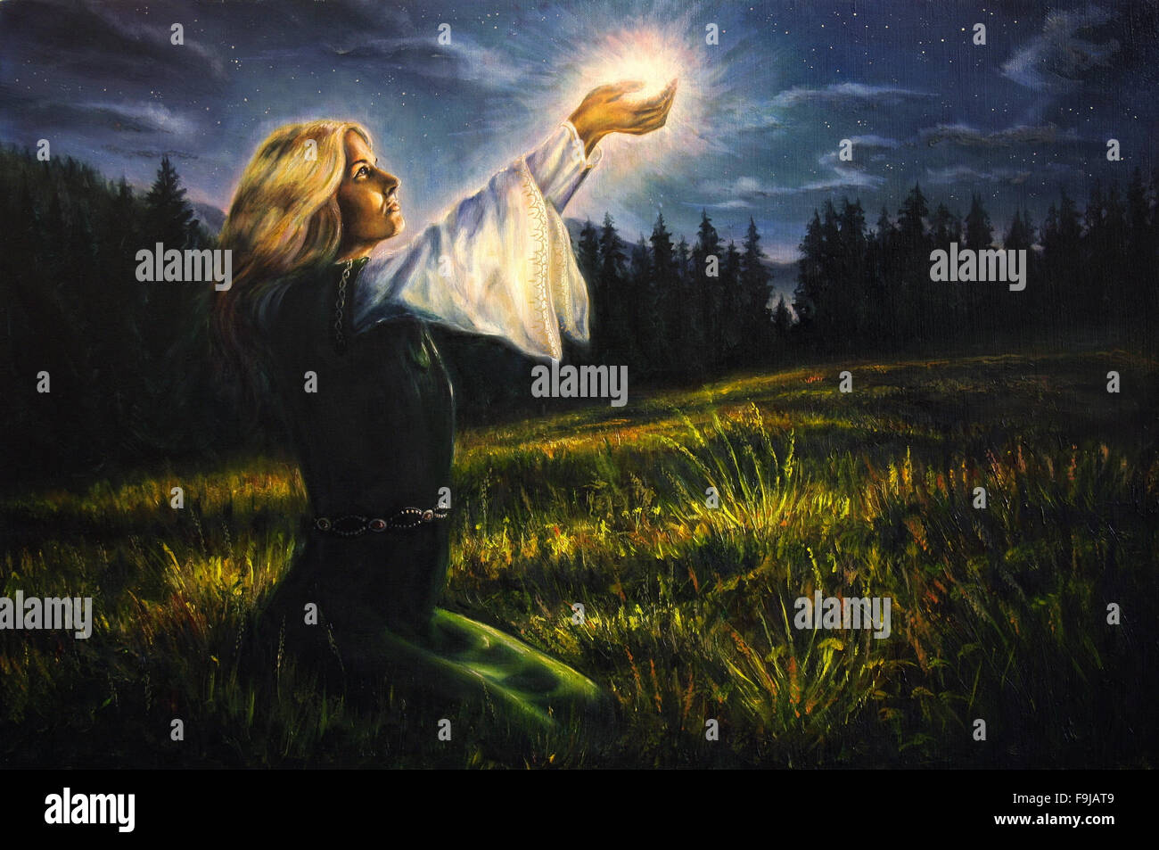 beautiful mystical young woman in green emerald medieval dress is holding a glowing ball of light in her palms amids a nocturnal meadow Stock Photo - Alamy beautiful mystical young woman in green emerald medieval dress is holding a glowing ball of light in her palms amids a nocturnal meadow Stock Photo - Alamy