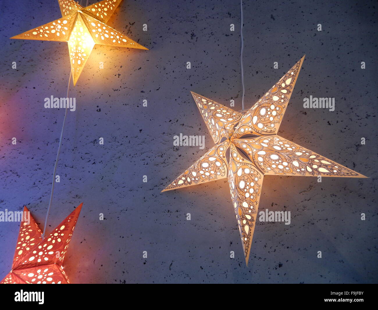 Three christmas stars in red and yellow hires stock photography and