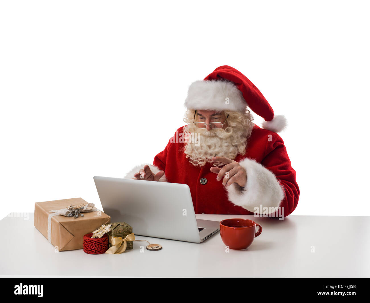 Santa Claus working with laptop Closeup Portrait Isolated on White ...