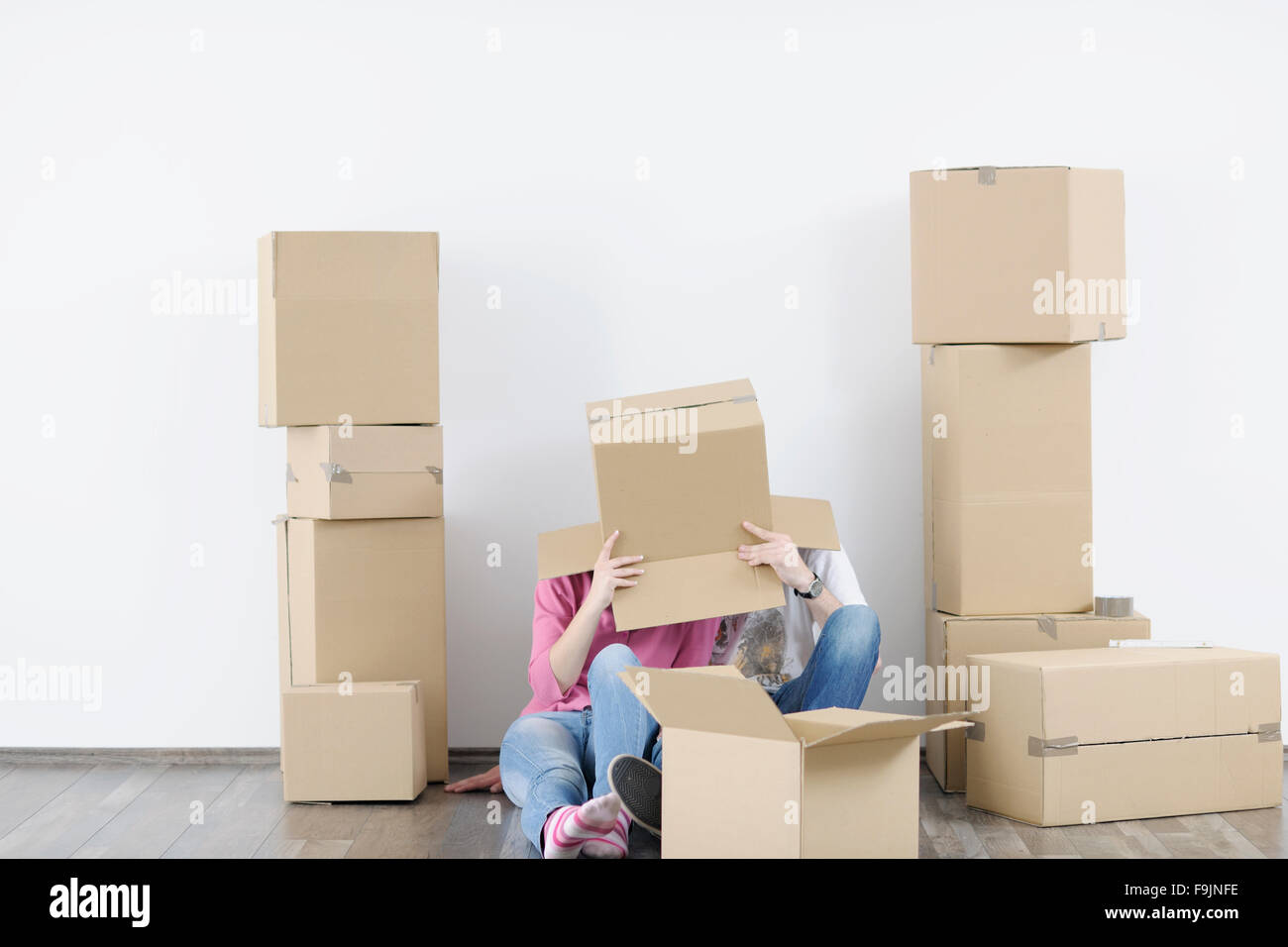 happy Young couple moving in new home Stock Photo - Alamy