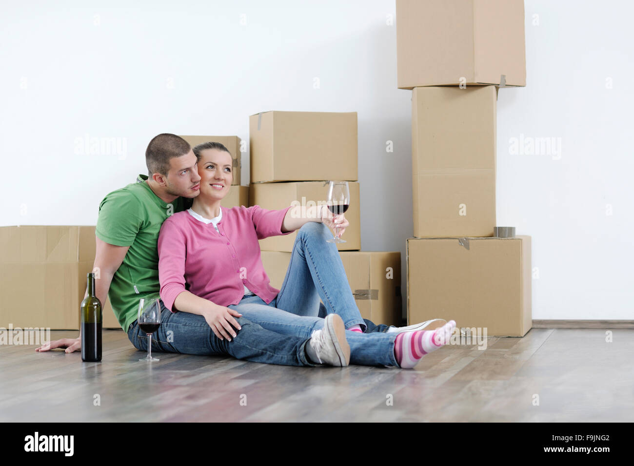 happy Young couple moving in new home Stock Photo - Alamy