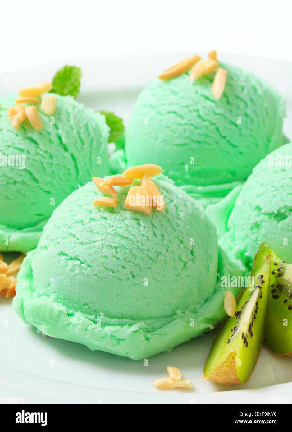 Scoops of light green ice cream Stock Photo