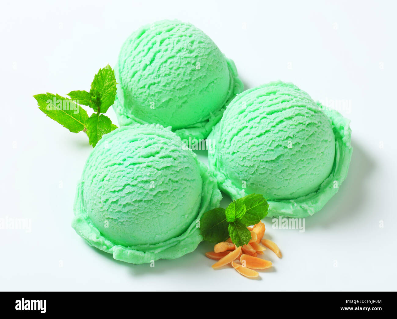 Scoops of green ice cream Stock Photo