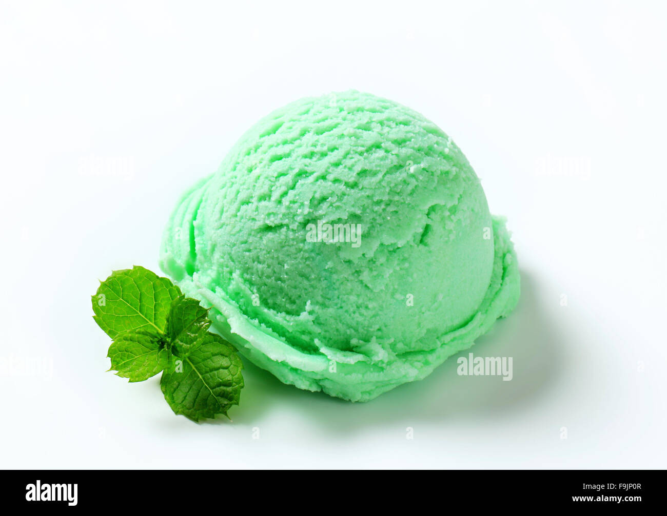 Scoop of green ice cream Stock Photo
