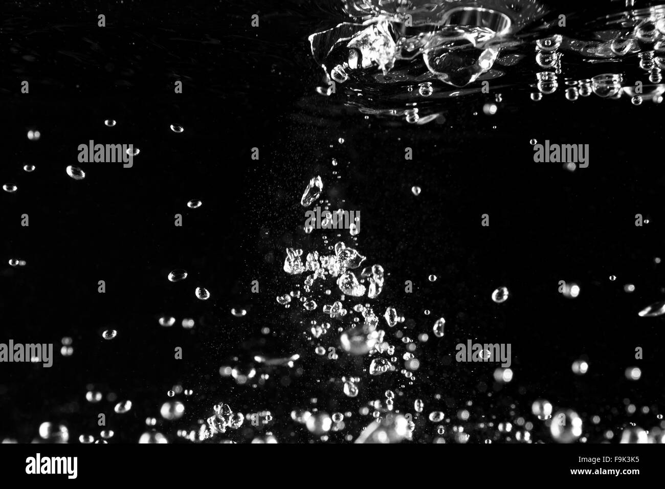Bubbles water at black background Stock Photo Alamy