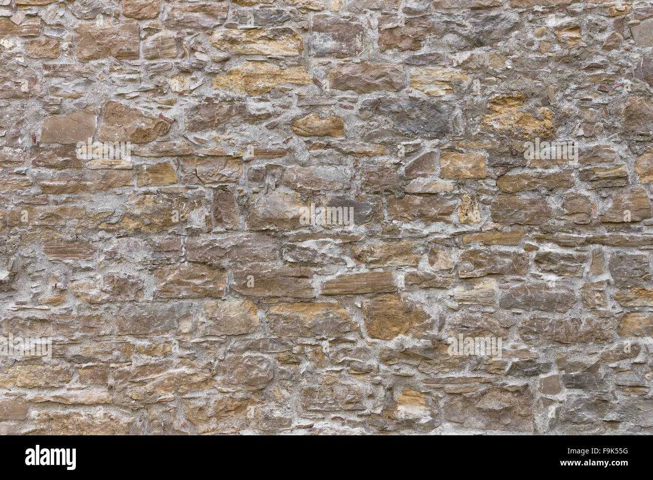 Details of an old restored wall in a religious context Stock Photo