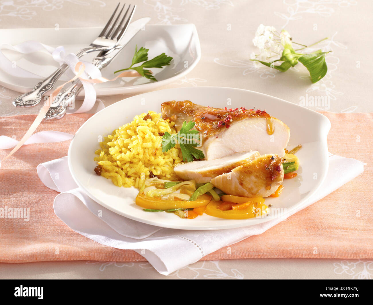 Honey chicken and saffron rice Stock Photo Alamy