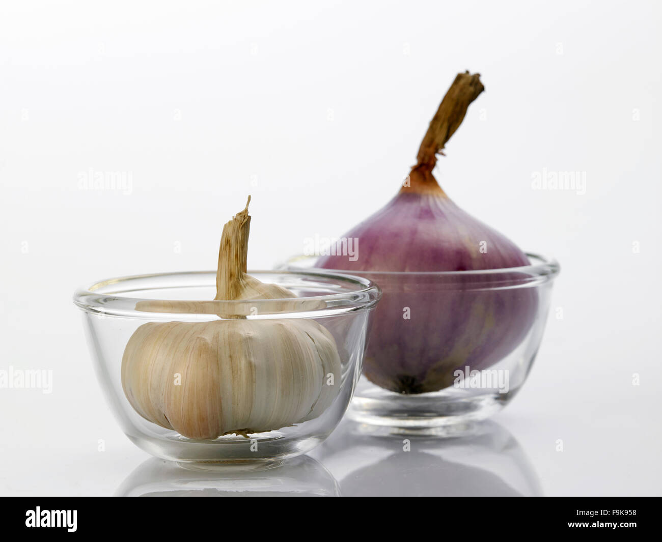 Onion and garlic clove isolated on white background Stock Photo - Alamy