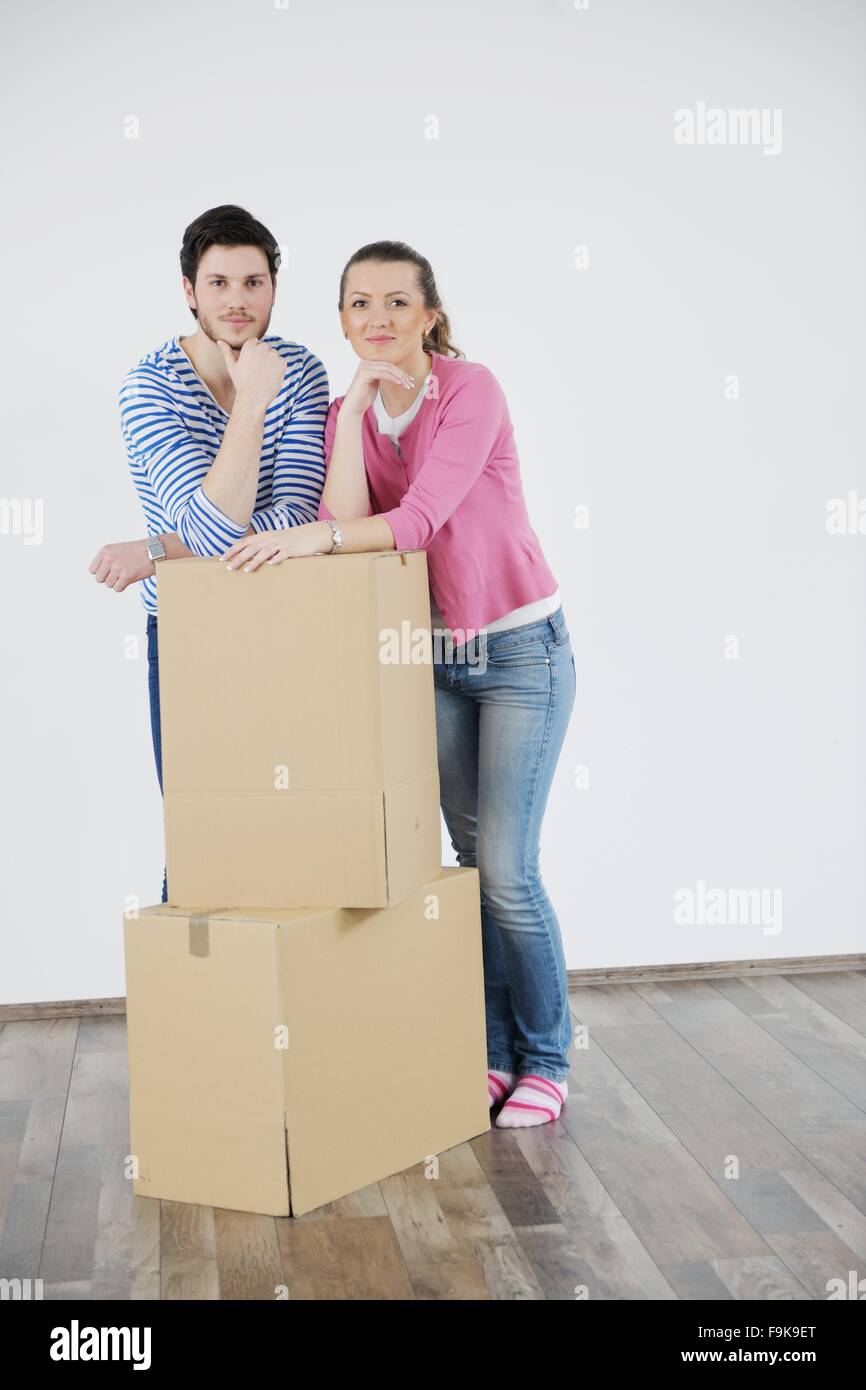 happy Young couple moving in new house Stock Photo - Alamy