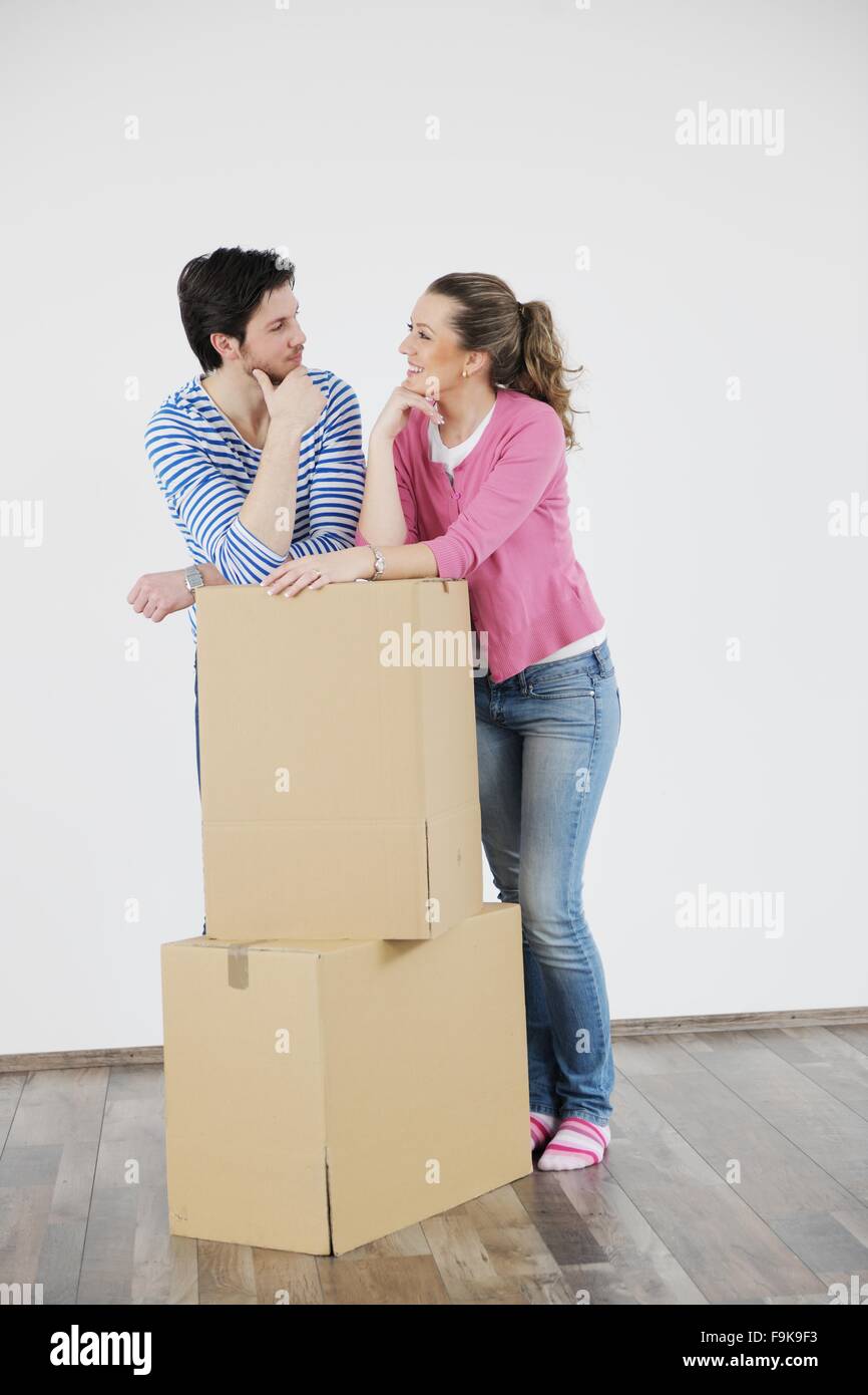 happy Young couple moving in new home Stock Photo - Alamy
