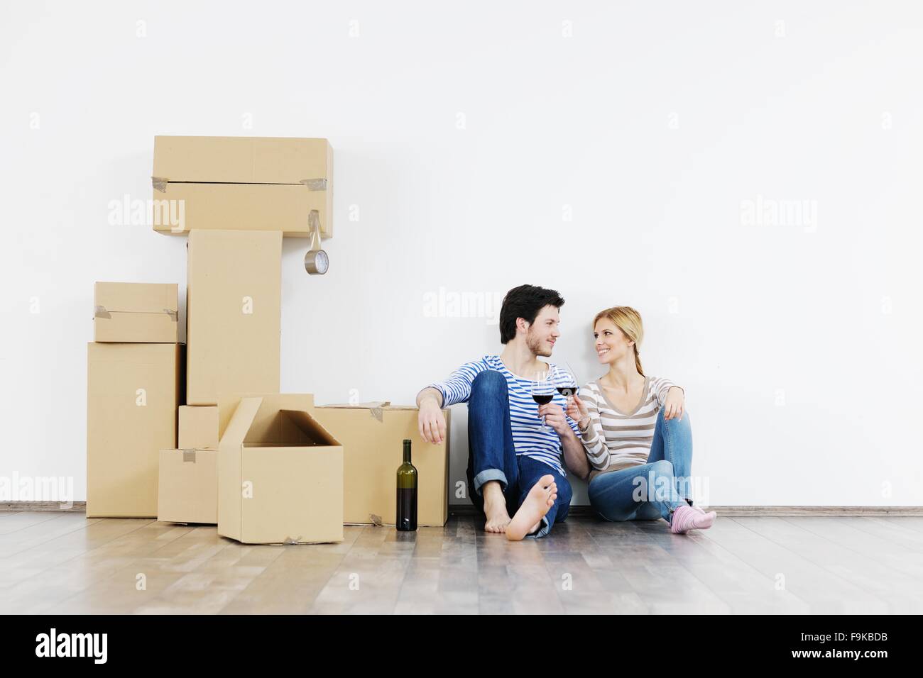 happy Young couple moving in new house Stock Photo - Alamy