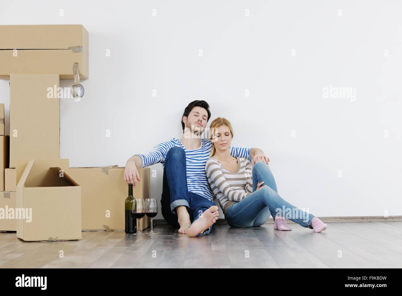 happy Young couple moving in new house Stock Photo - Alamy