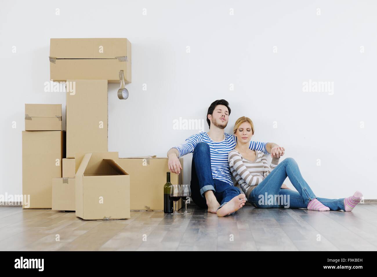 happy Young couple moving in new house Stock Photo - Alamy