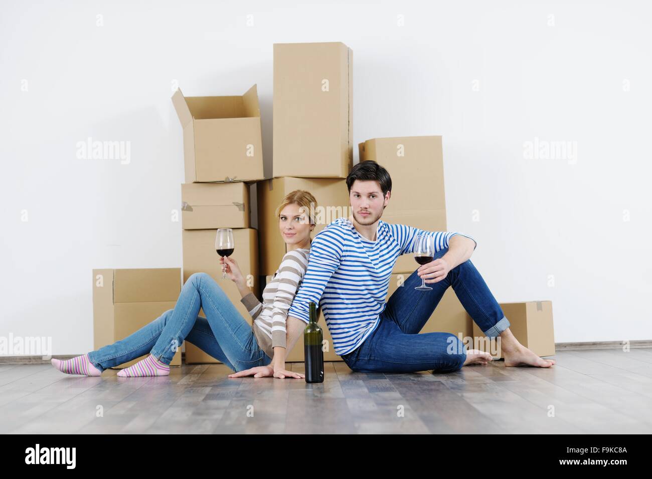 happy Young couple moving in new house Stock Photo - Alamy